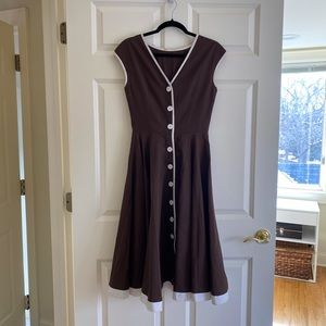 Mocha brown vintage A Line dress with white trim and white buttons. Size XS-S.